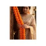 Artificial orange marigold garlands hung for Diwali — GG Gift, Jaipur